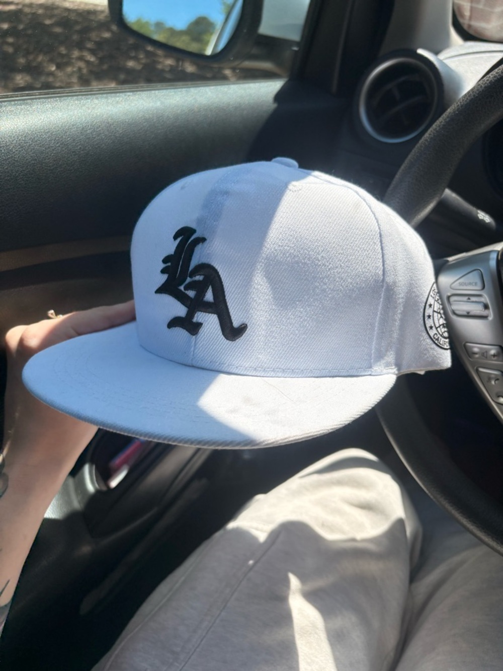 White LA Embroidered Snapback Hat